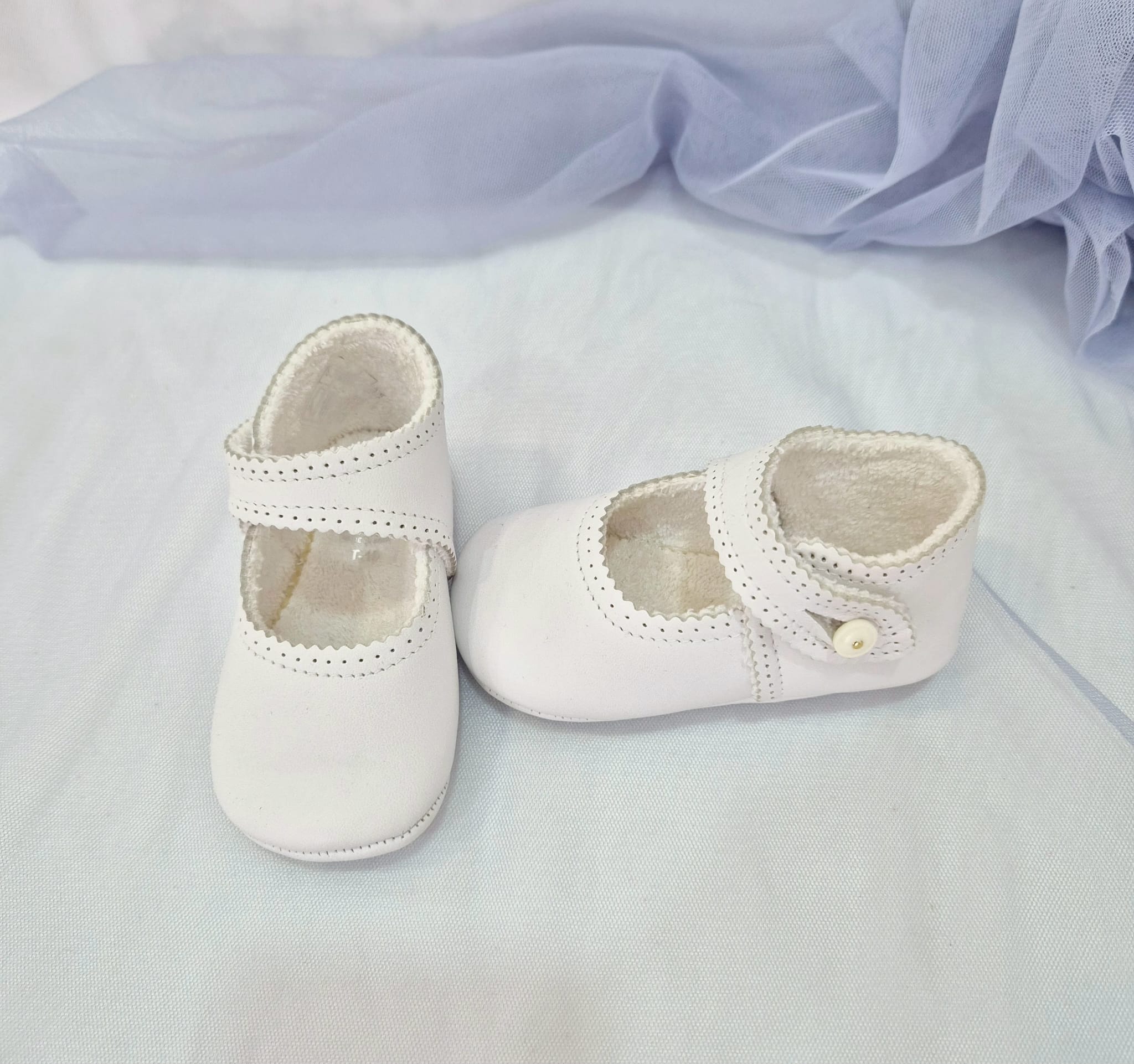 Zapato sin suela botón