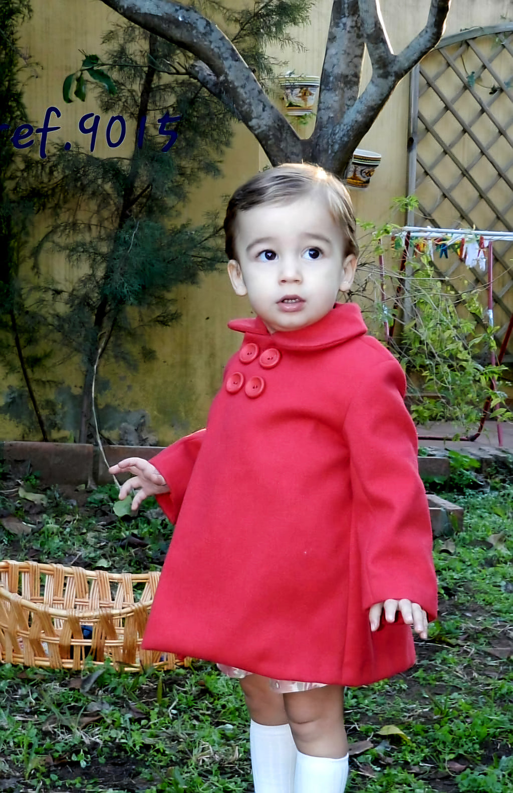 Abrigo niño cuatro botones