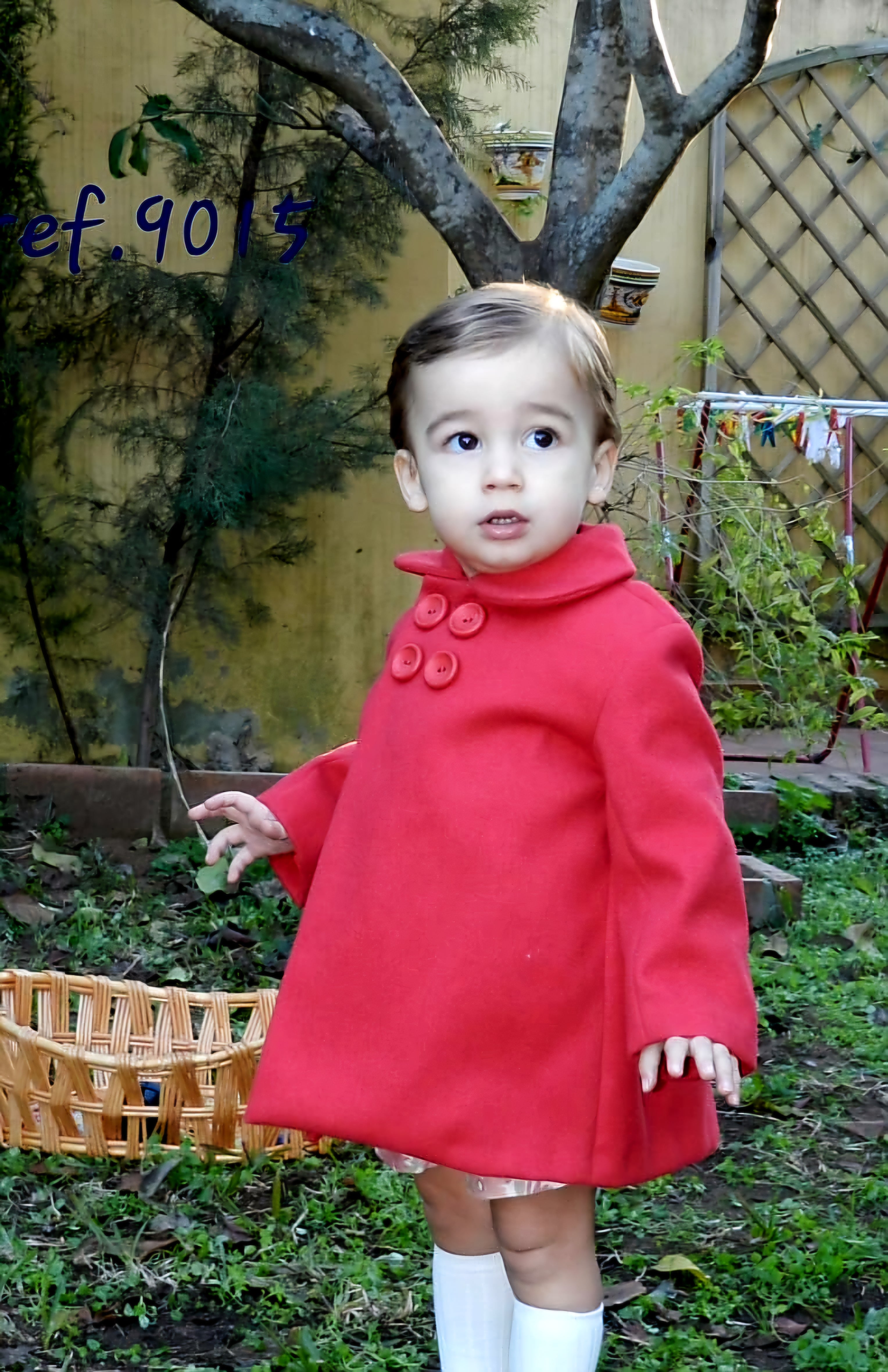 Abrigo niño cuatro botones
